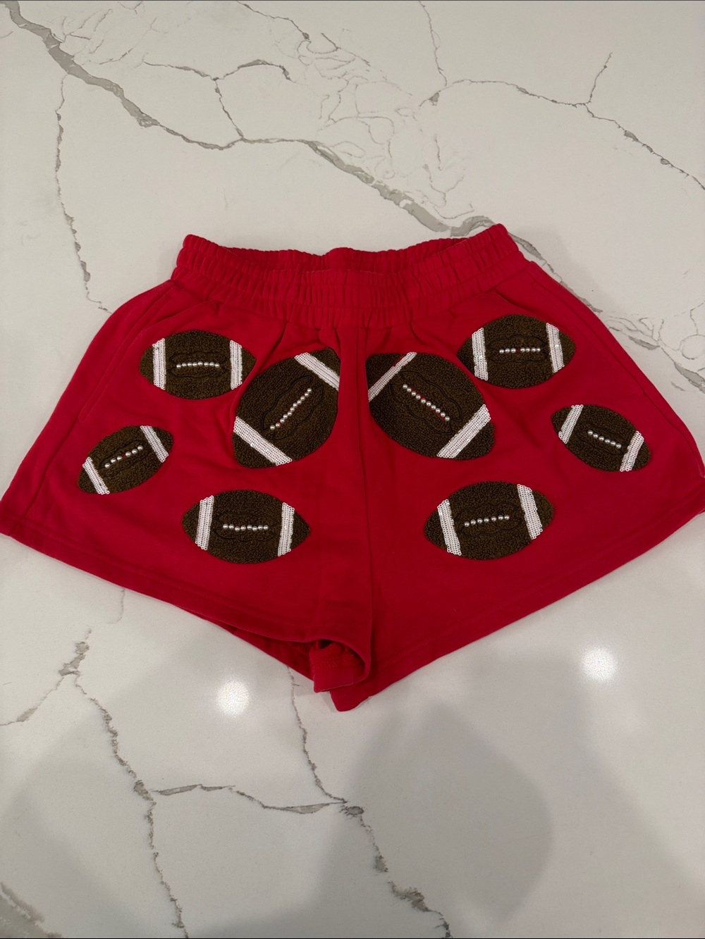 Queen of sparkle Red Athletic Shorts with Football Appliqués
